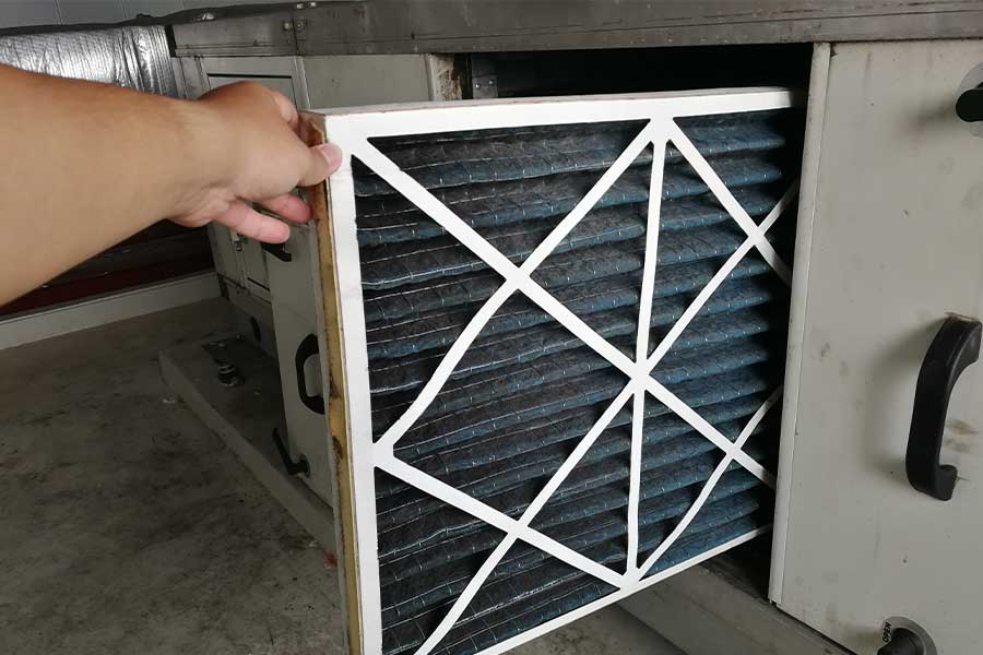 Air filter replacement in progress